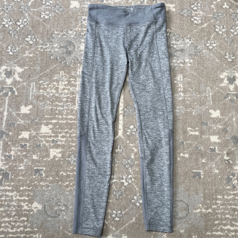 Althleta Girl Grey snowball tight. Size L/12. New Condition. Never worn
